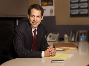 Photo of Berly Nelson at a desk